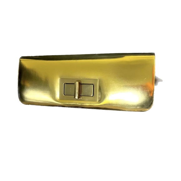 NWT - Olga berg gold clutch bag. NWT. Comes with chain strap. Rectangular clasp. - Picture 2 of 15